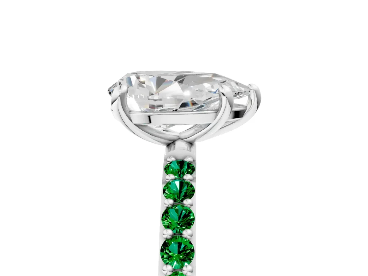 Pear Cut Diamond Solitaire Ring with Round Emerald Pavé Band and Prong Setting Platinum
