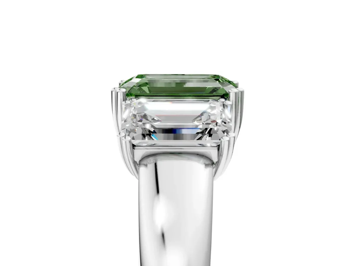 Fancy Green Three-Stone Emerald Cut Cut Diamond Ring with Channel Set Band and Four-Prong Setting Silver