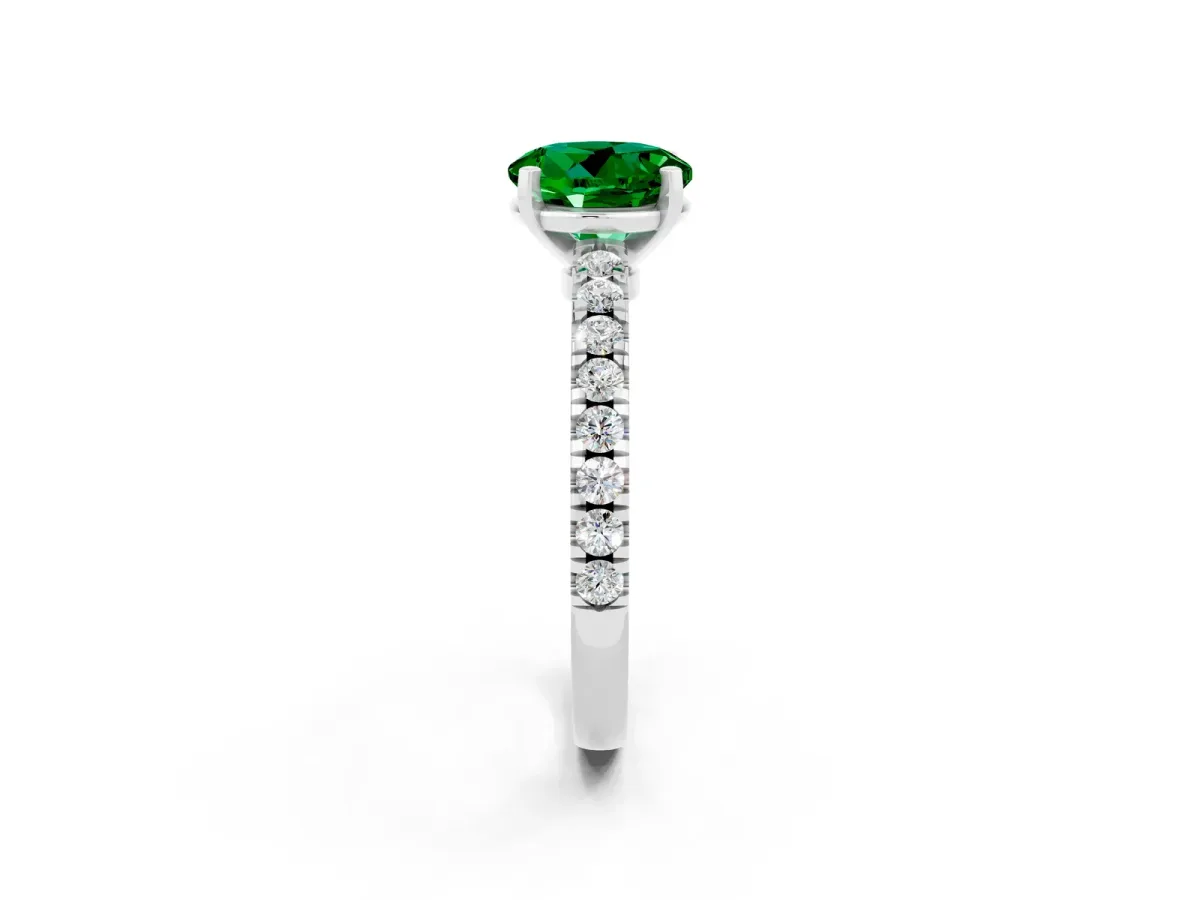 Round Cut Solitaire Emerald with Pavé Band and Four-Prong Setting Platinum