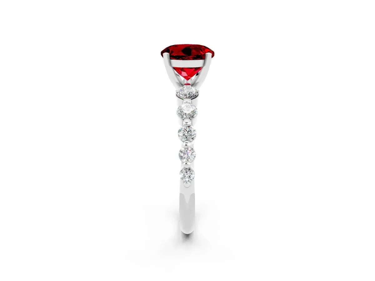 Round Cut Solitaire Ruby Ring with Pave Band and Four-Prong Setting Silver