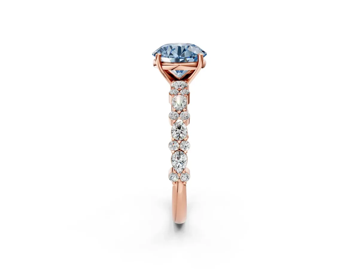 Fancy Blue Round Cut Diamond Side Stone Solitaire Ring with Round and Four-Prong Setting Rose gold