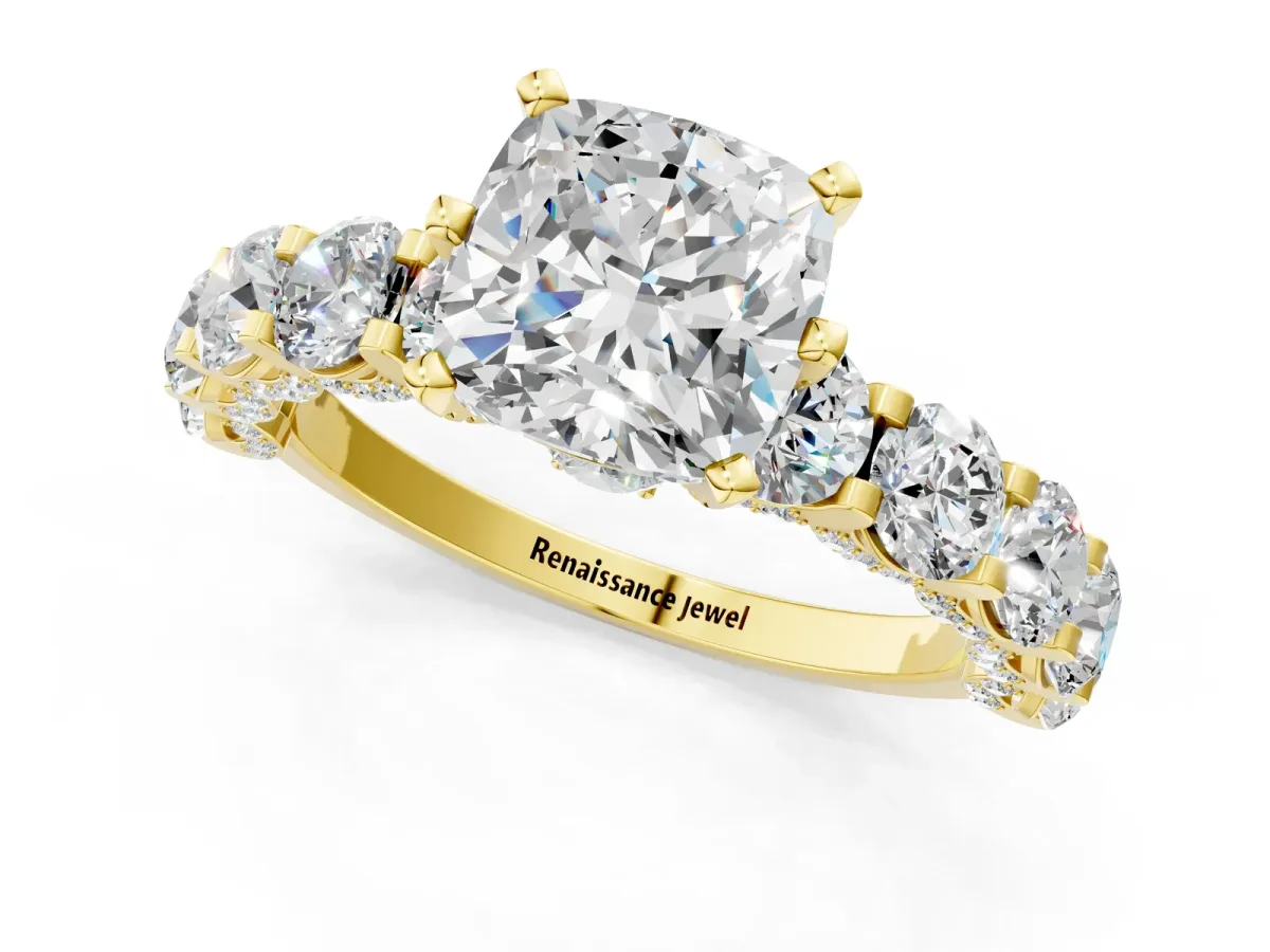 Cushion Cut Diamond Side Stone Engagement Ring with Four-Prong Setting Yellow gold