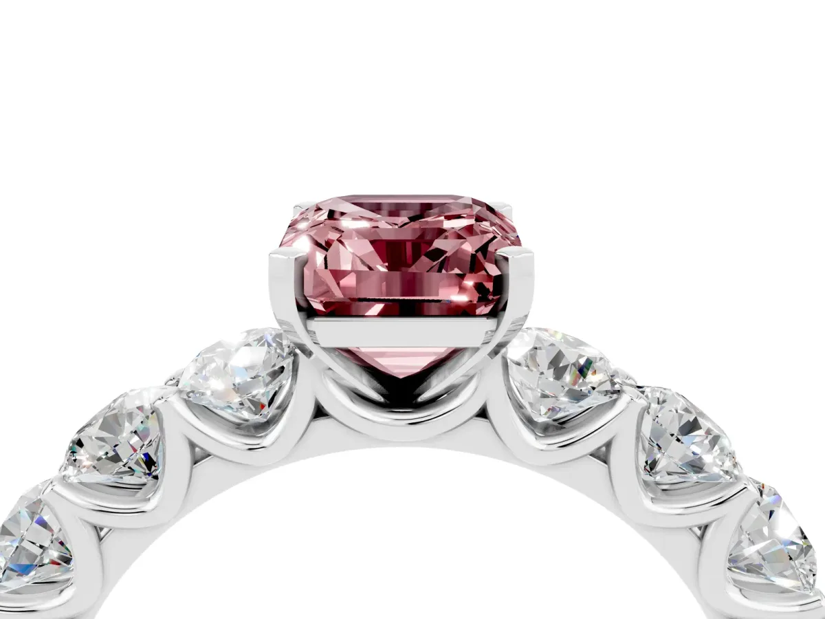 Emerald Cut Morganite Prong Setting with Side Stones on a Pave Band Platinum