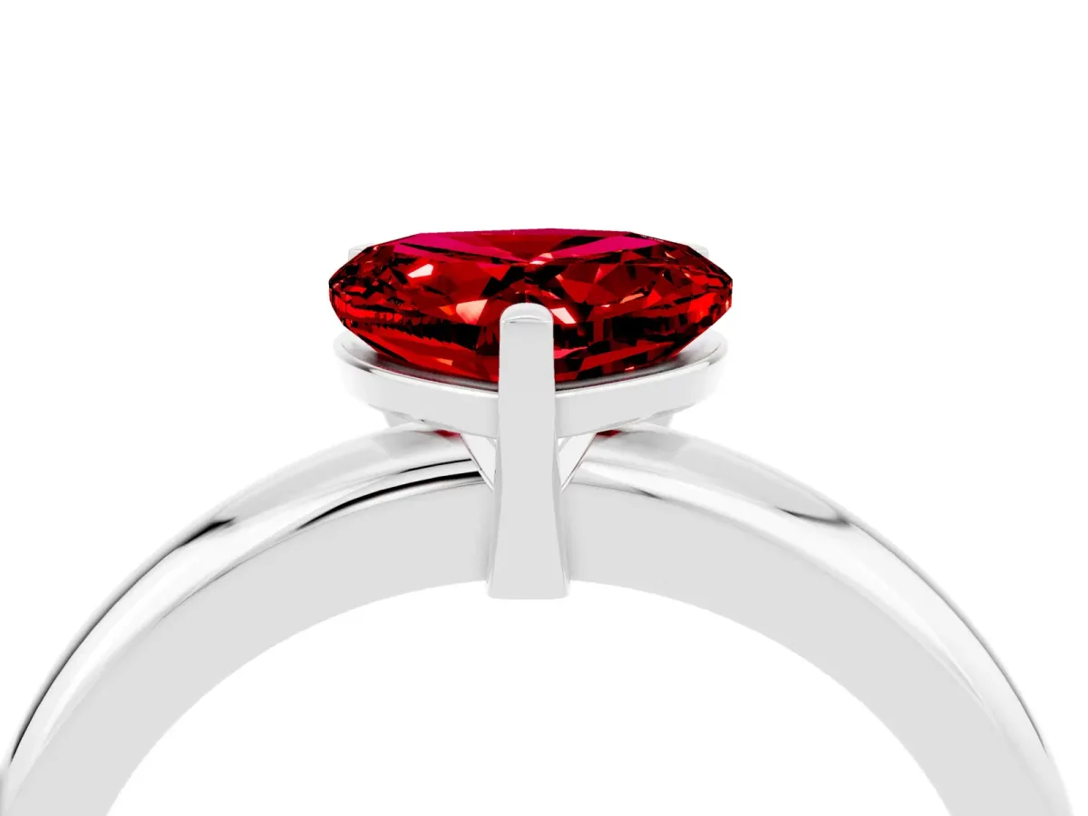 Heart Cut Ruby Solitaire Engagement Ring with Round Band and Four-Prong Setting Silver