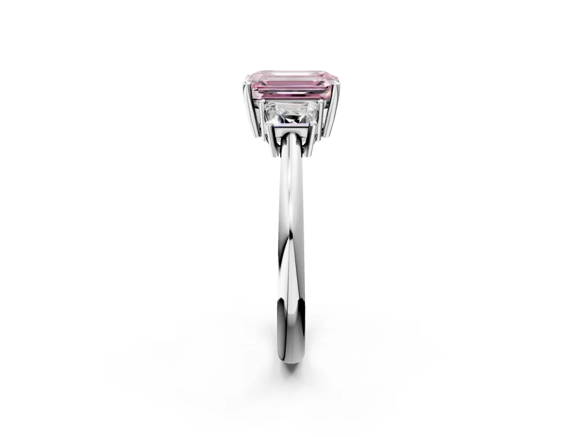 Fancy Pink Emerald Cut Diamond Three-Stone Ring with Trapezoid Side Stones and Prong Setting Platinum