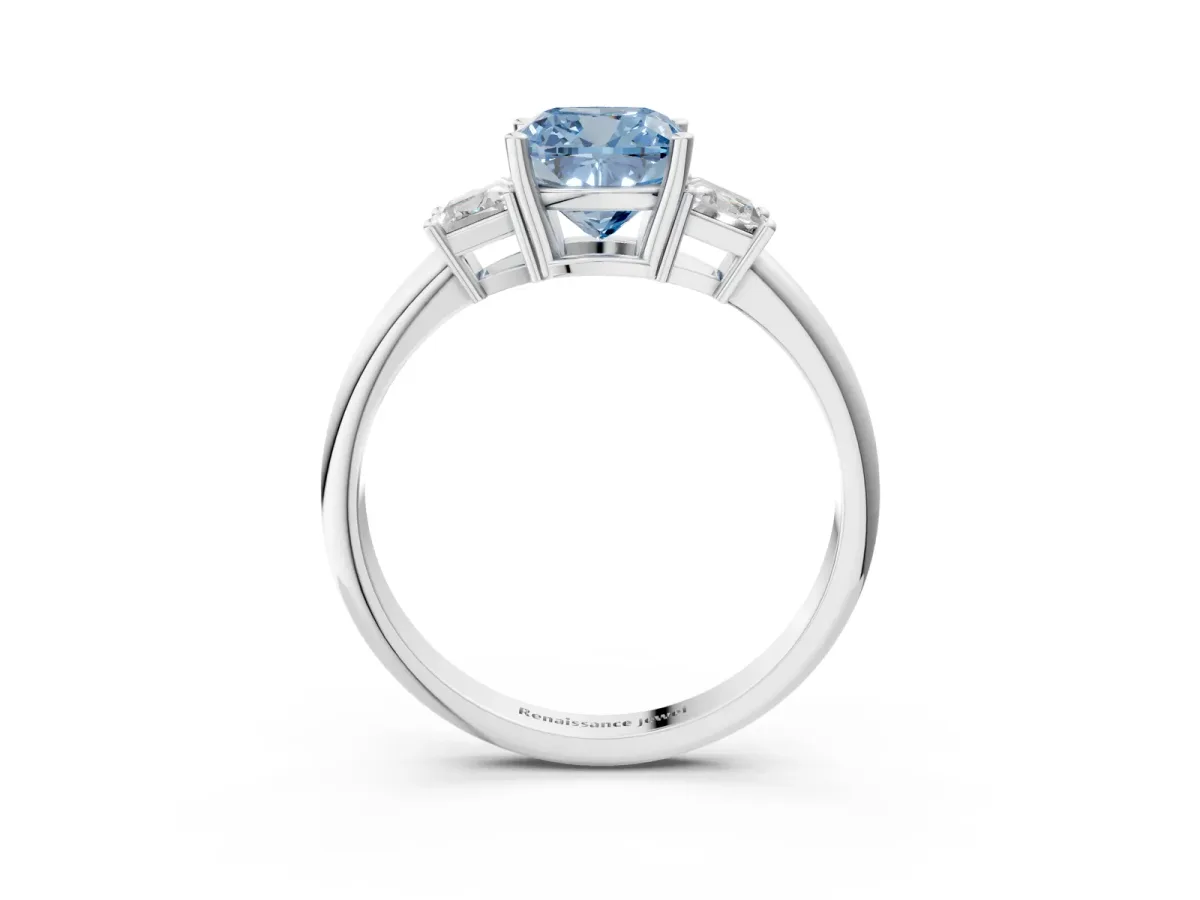 Fancy Blue Cushion Cut Diamond Three-Stone Ring with Trapezoid Side Stones and Prong Setting Platinum