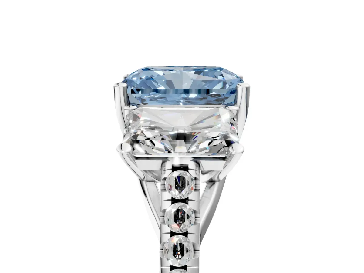 Fancy Blue Three-Stone Radiant Cut Diamond Ring with Round Pavé Band and Prong Setting Silver