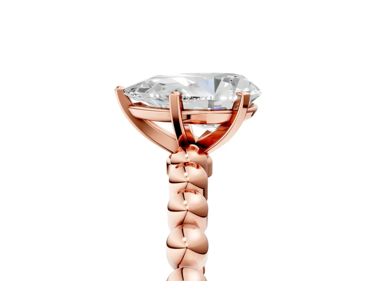 Pear Cut Diamond Solitaire Ring with Beaded Band and Prong Setting Rose gold