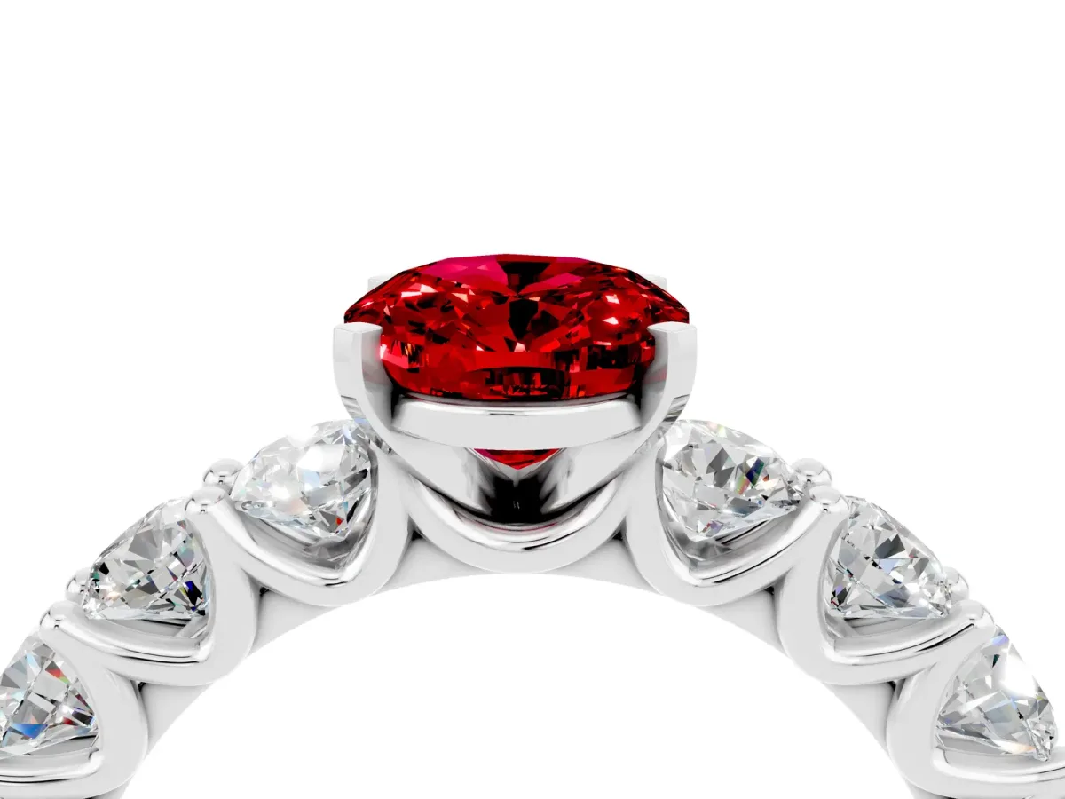 Oval Cut Ruby Prong Setting with Side Stones on a Pave Band Platinum