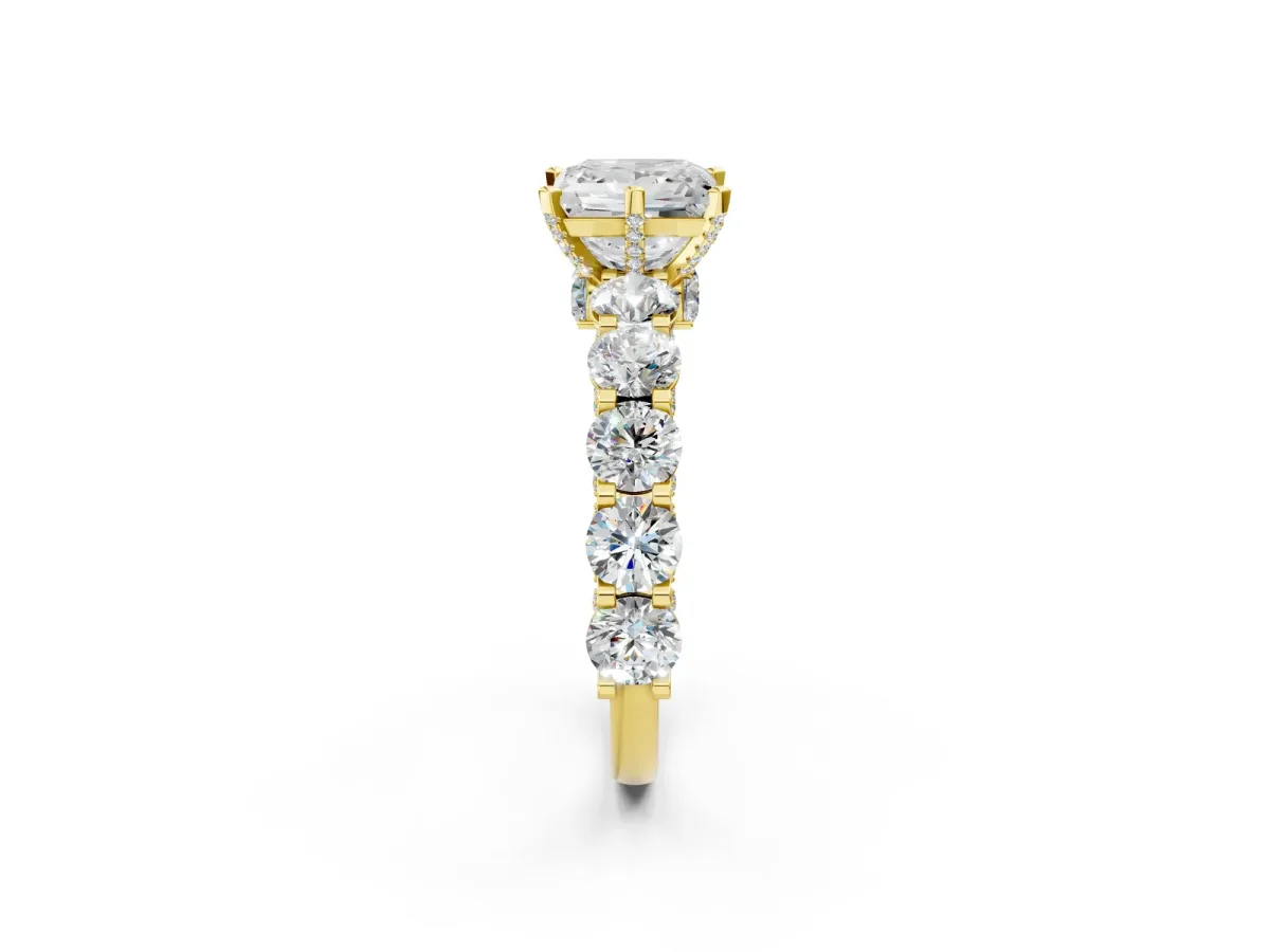 Princess Cut Diamond Side Stone Engagement Ring with Four-Prong Setting Yellow gold
