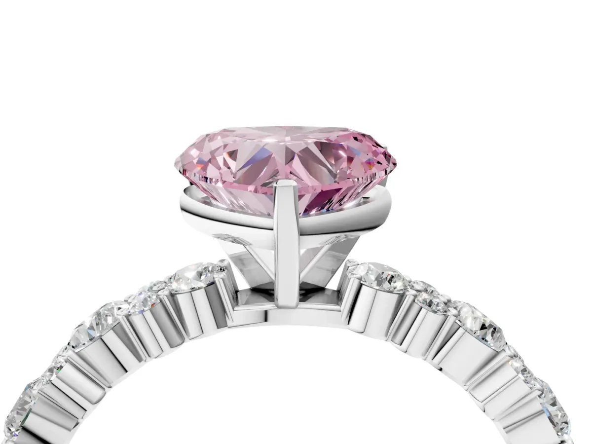 Fancy Pink Heart Cut Diamond Side Stone Solitaire Ring with Round and Four-Prong Setting Platinum