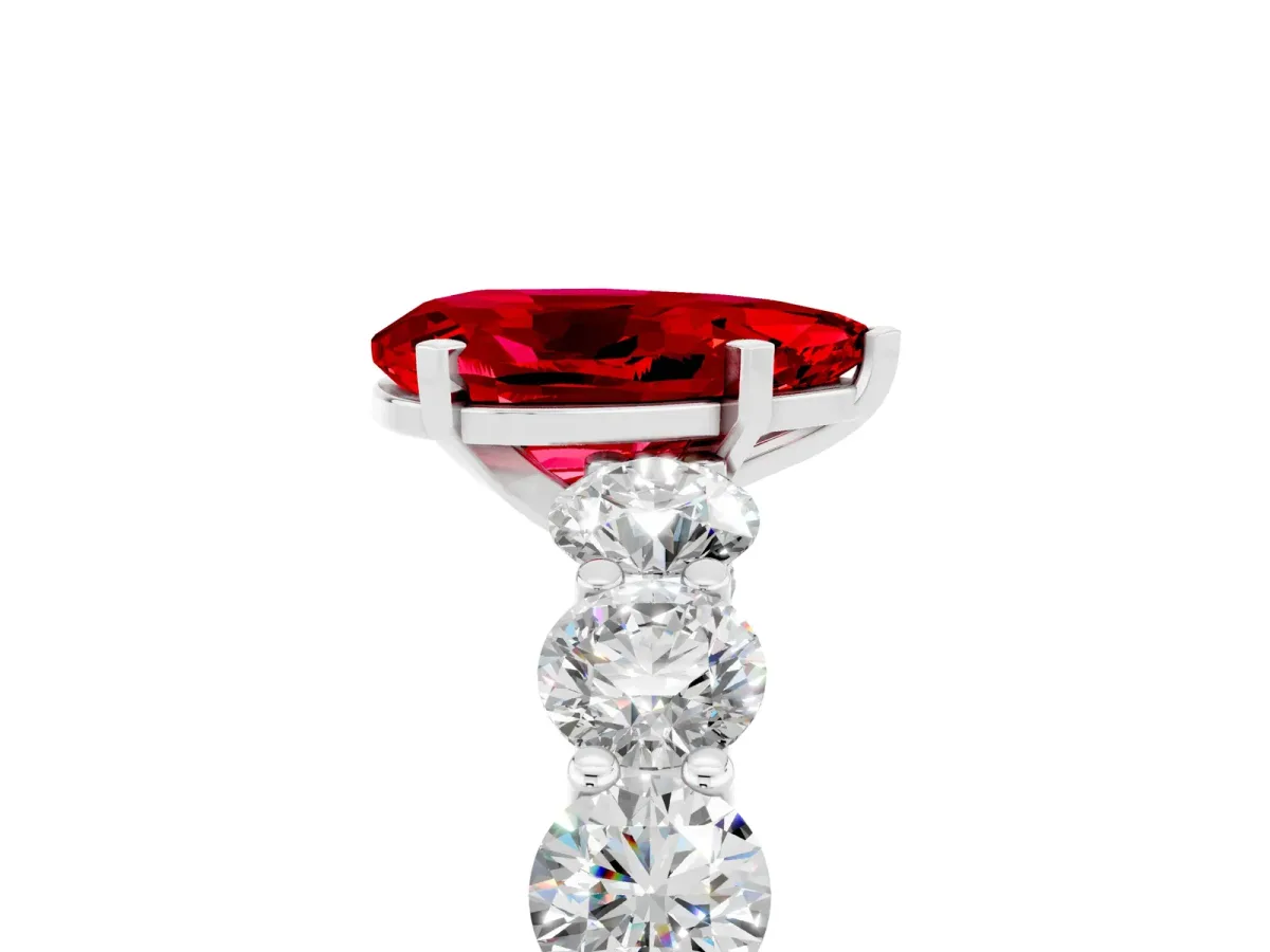 Pear Cut Ruby Prong Setting with Side Stones on a Pave Band Silver