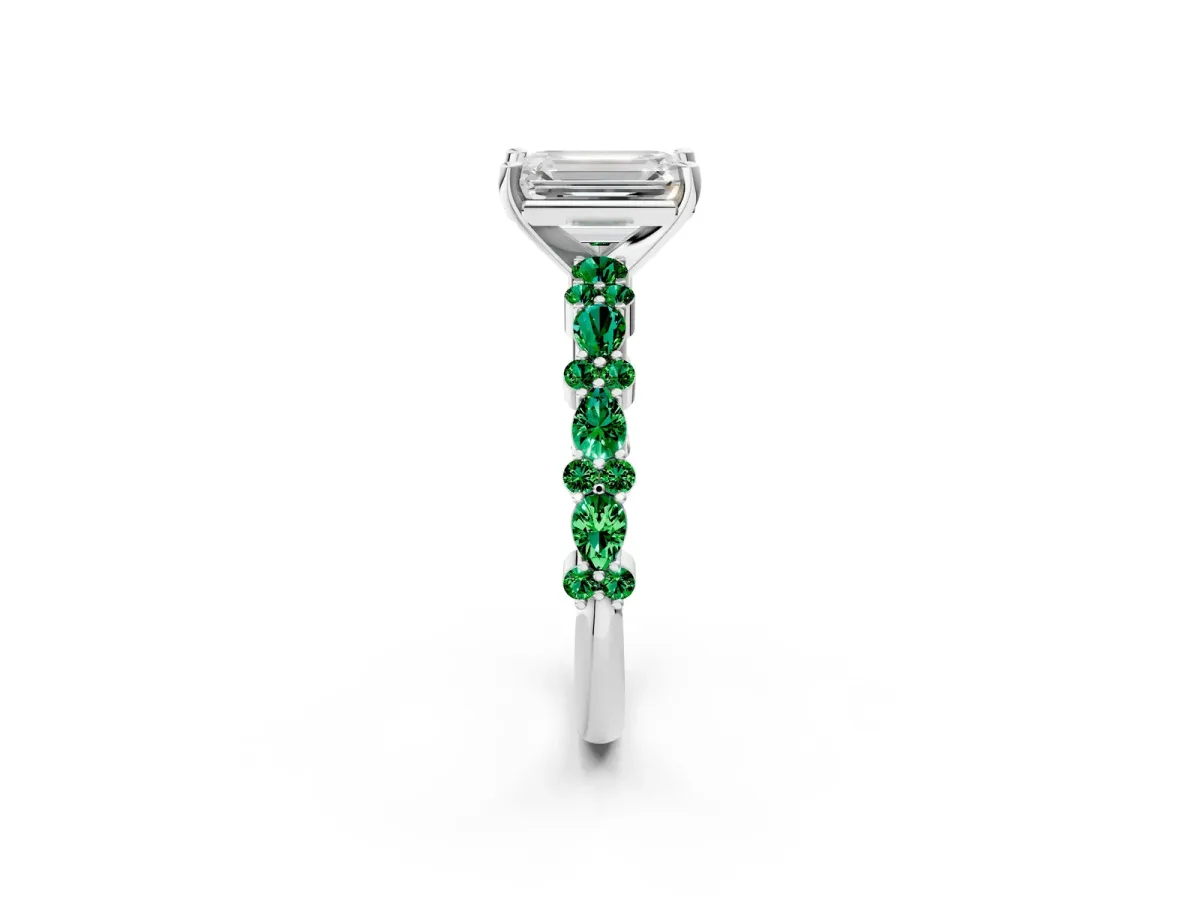 Emerald Cut Diamond Side Stone Solitaire Ring with Round Emerald and Four-Prong Setting Platinum