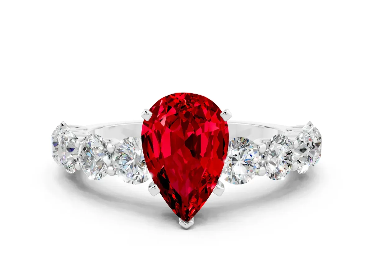 Pear Cut Ruby Prong Setting with Side Stones on a Pave Band Silver