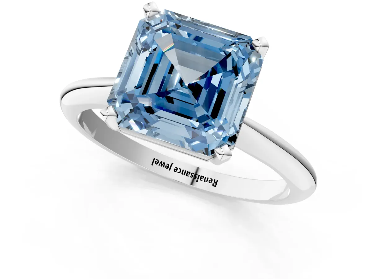 Fancy Blue Asscher Cut Cut Solitaire Ring with Four-Prong Setting on a Classic Band Platinum