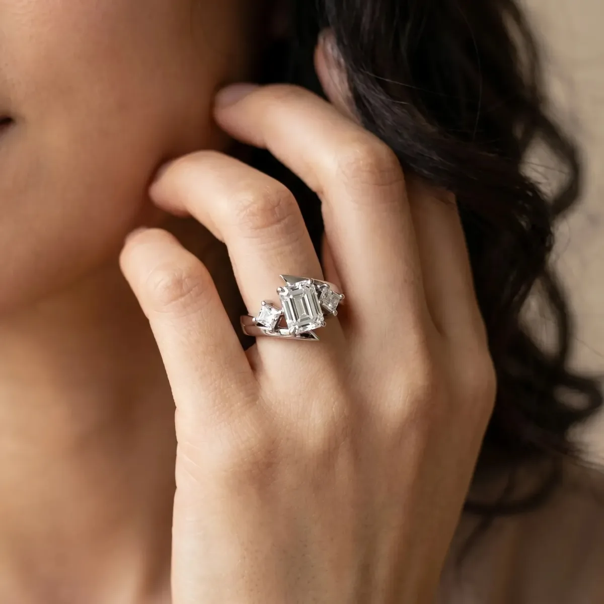 Three-Stone Emerald Cut Cut Tension Band Ring with Four-Prong Setting Platinum