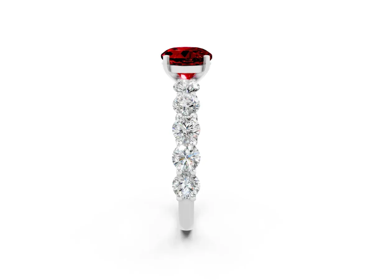 Round Cut Ruby Prong Setting with Side Stones on a Pave Band Platinum