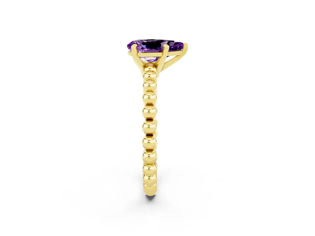 Pear Cut Amethyst Solitaire Ring with Beaded Band and Prong Setting Yellow gold