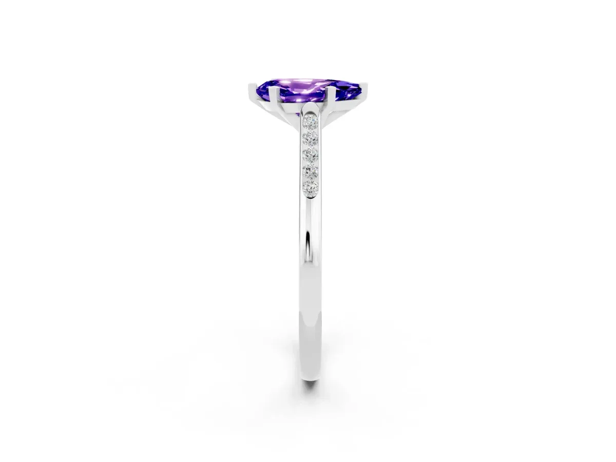 Pear Cut Tanzanite Solitaire Ring with Channel Set Round Band and Prong Setting Silver