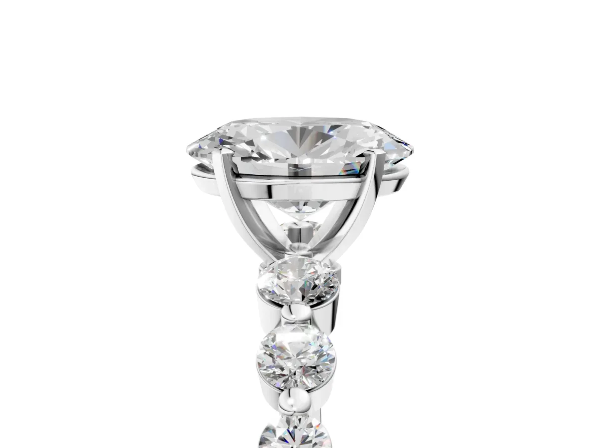 Oval Cut Solitaire Diamond Ring with Pave Band and Four-Prong Setting Silver