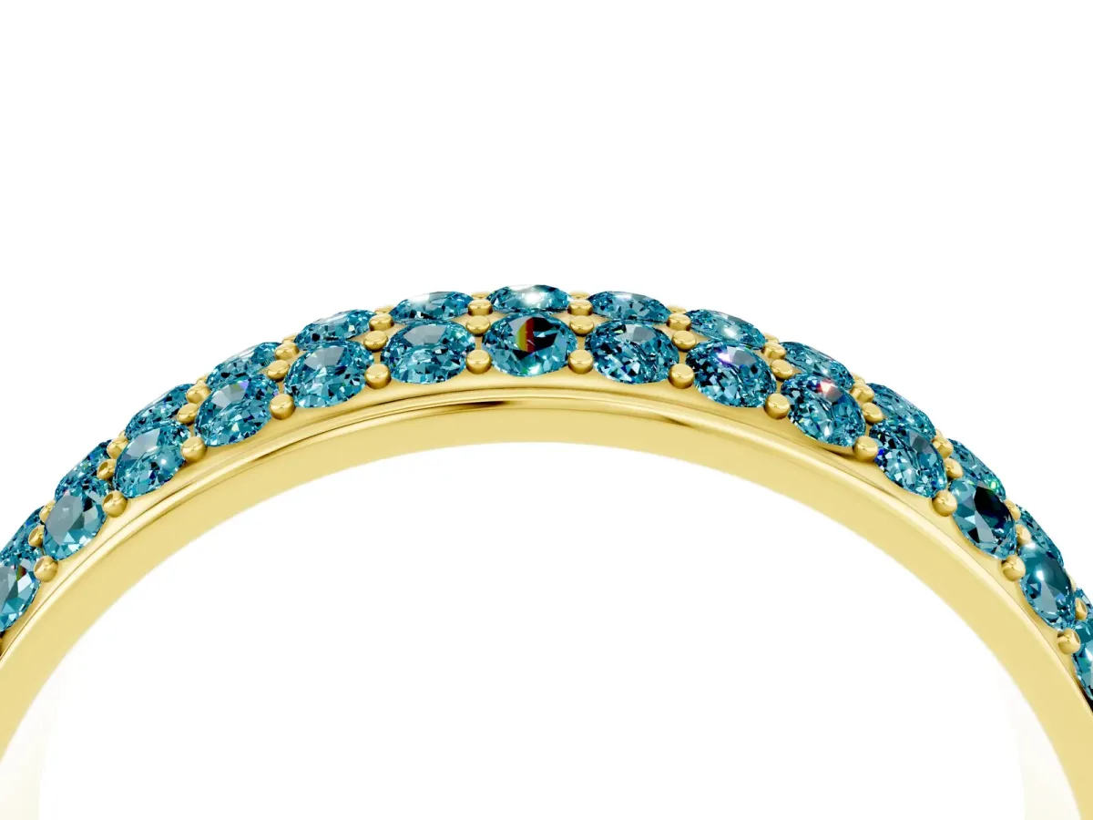 Three-Row Round Blue Topaz Eternity Band with Shared Prong Setting Yellow gold