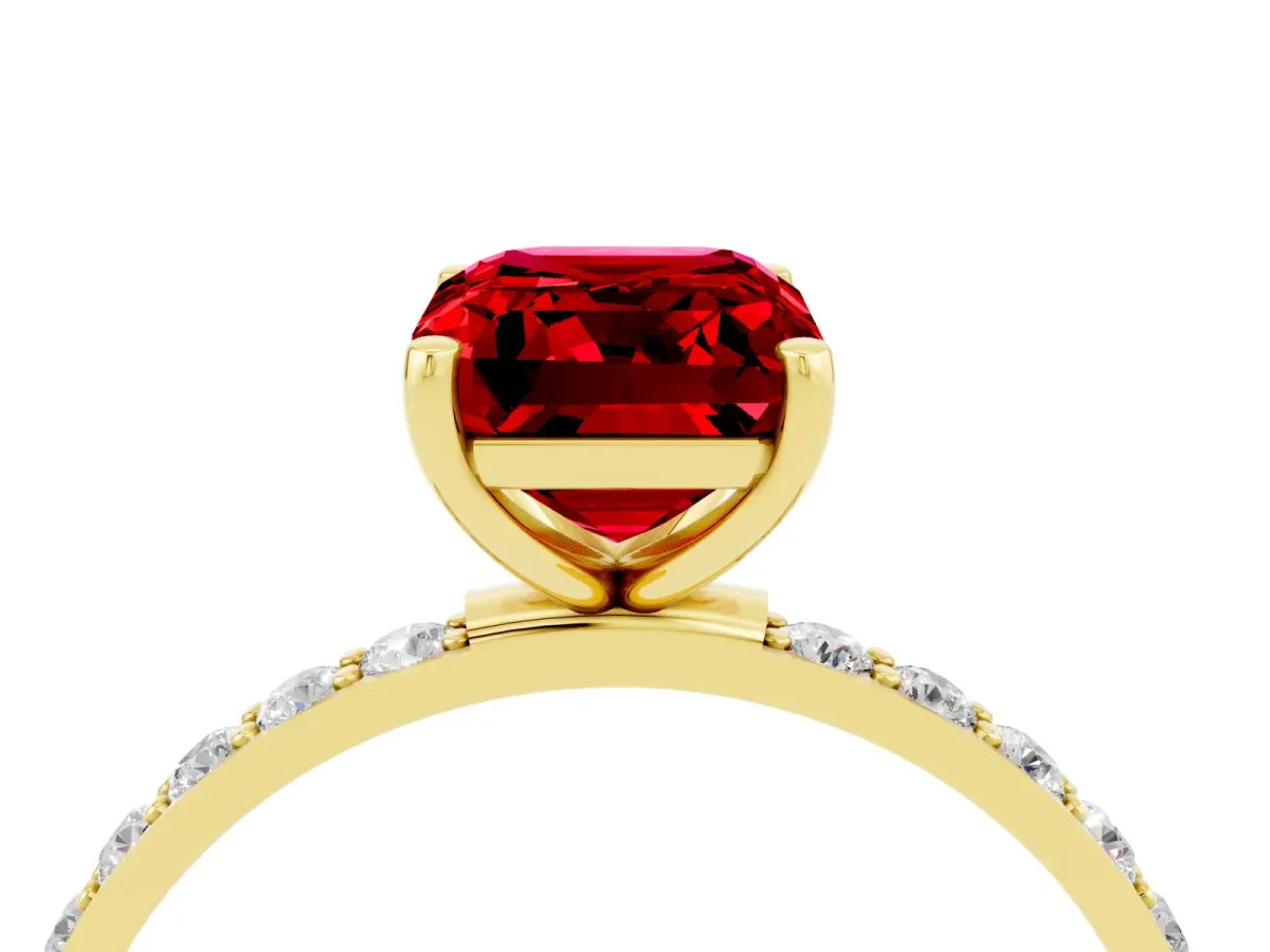 Emerald Cut Ruby Solitaire Ring with Round Pavé Band and Prong Setting Yellow gold