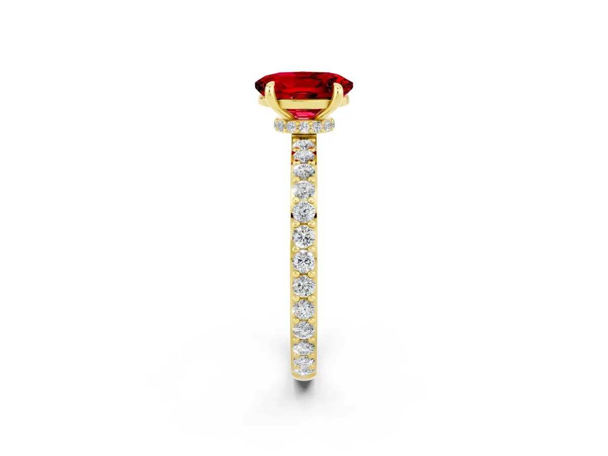 Oval Cut Ruby Solitaire Engagement Ring with Pavé Band and Four-Prong Setting Yellow gold