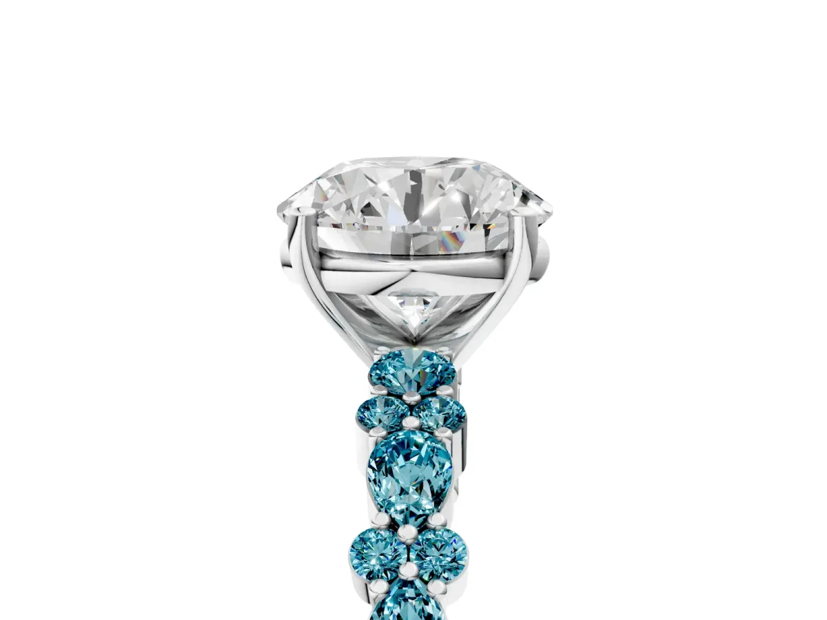 Round Cut Diamond Side Stone Solitaire Ring with Round Blue Topaz and Four-Prong Setting Silver