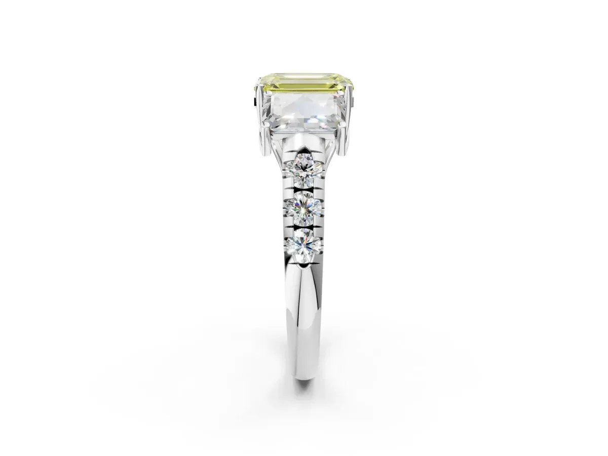 Fancy Yellow Three-Stone Emerald Cut Diamond Pavé Band with Prong Setting Platinum