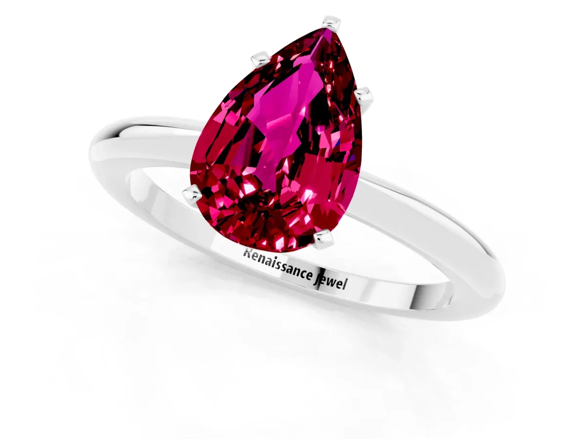 Pear Cut Garnet Solitaire Ring with Six-Prong Setting and Classic Band Silver