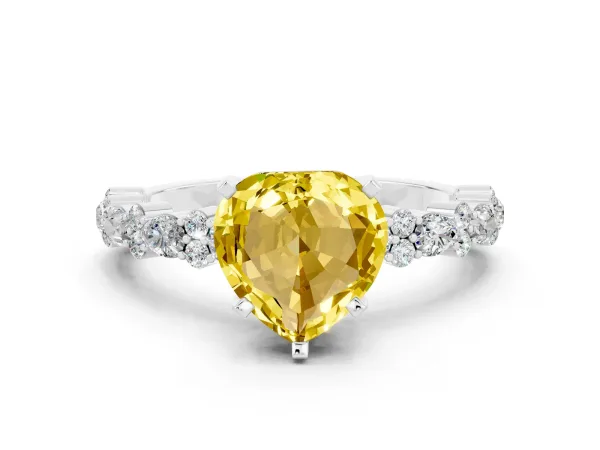 Heart Cut Yellow Sapphire Side Stone Solitaire Ring with Round and Four-Prong Setting Platinum