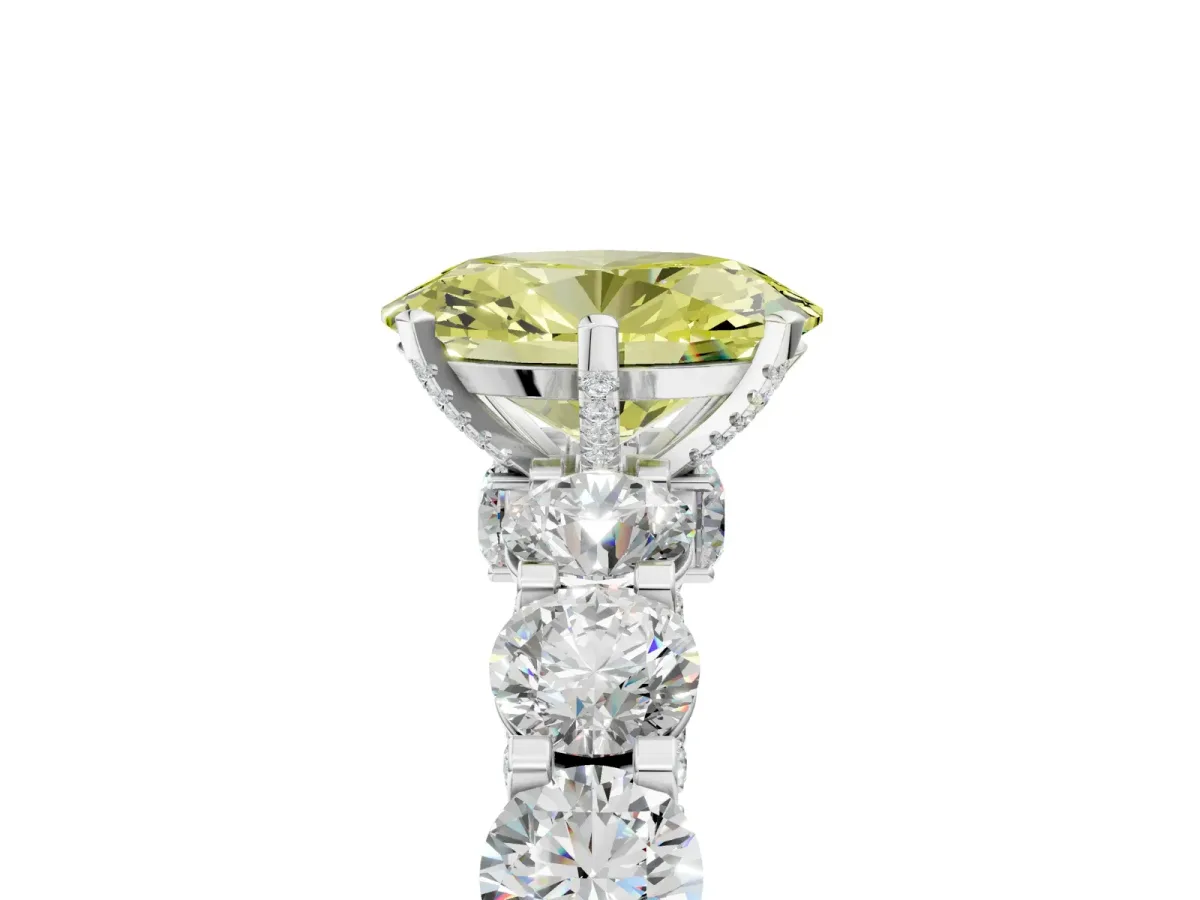 Fancy Yellow Oval Cut Diamond Side Stone Engagement Ring with Four-Prong Setting White gold