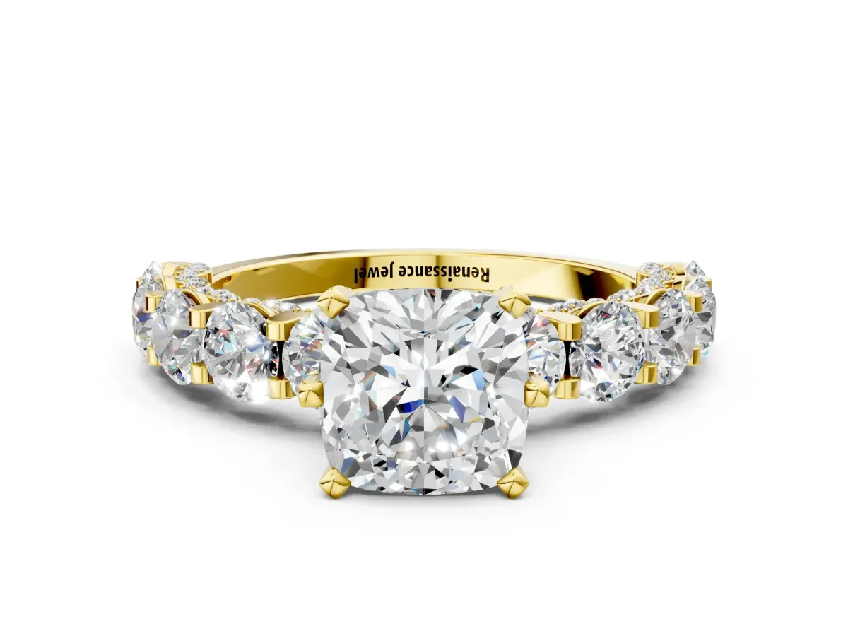 Cushion Cut Diamond Side Stone Engagement Ring with Four-Prong Setting Yellow gold