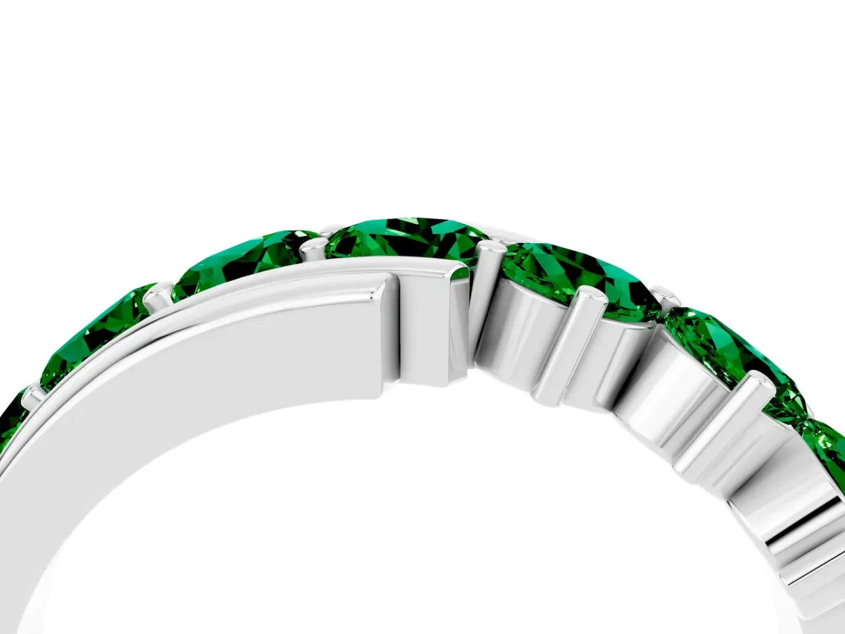 Round Emerald Wave Band with Channel and Shared Prong Setting Platinum