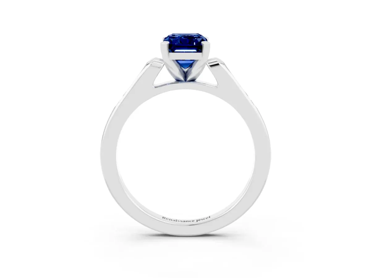 Emerald Cut Blue Sapphire Solitaire Ring with Channel Set Round Band and Prong Setting Silver