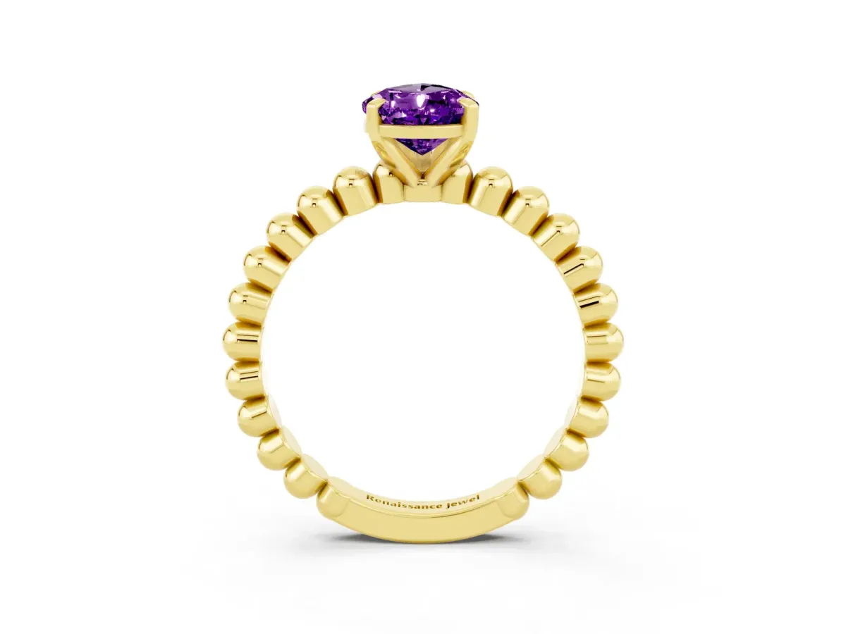 Pear Cut Amethyst Solitaire Ring with Beaded Band and Prong Setting Yellow gold