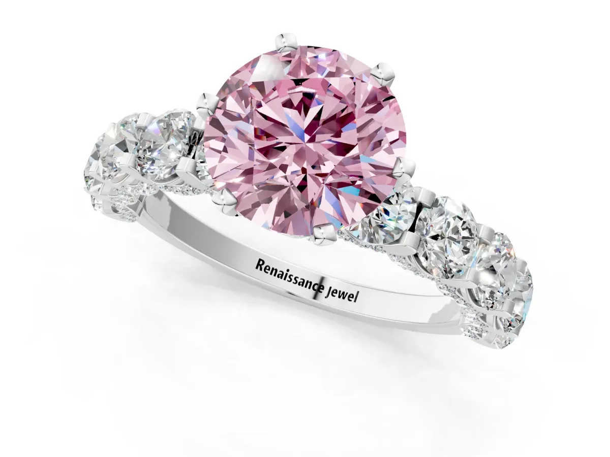 Fancy Pink Round Cut Diamond Side Stone Engagement Ring with Four-Prong Setting Silver