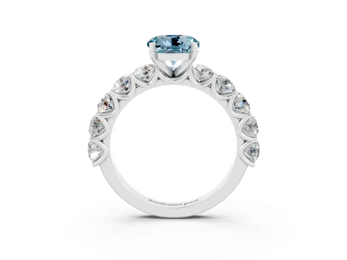 Round Cut Aquamarine Prong Setting with Side Stones on a Pave Band Silver